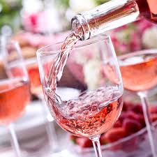 Rose being poured into a wine glass.