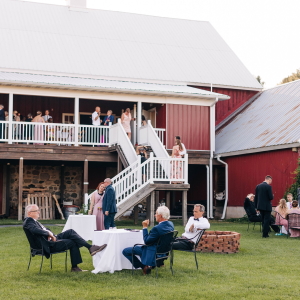 Wedding guests enjoying the Barn Courtyard.