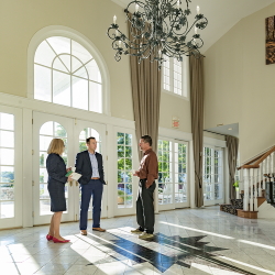 Bussiness people talking in the lobby.