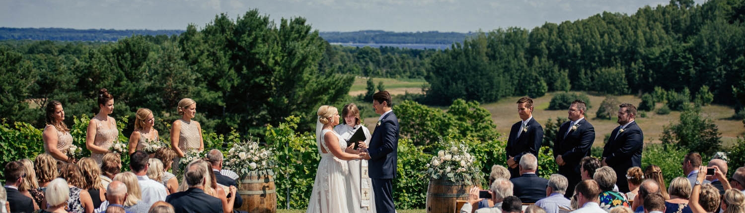 A gorgeous wedding with a view at Black Star Farms, one of the most sought after Traverse City wedding venues