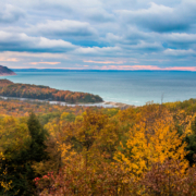 Take a gorgeous fall trip on the Pierce Stocking Scenic Drive to see magnificent fall foliage like this on the Sleeping Bear Dunes National Lakeshore