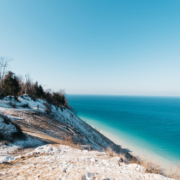 Gorgeous winter scenery of Lake Michigan at Sleeping Bear Dunes - one of the best things to do in Traverse City in the winter