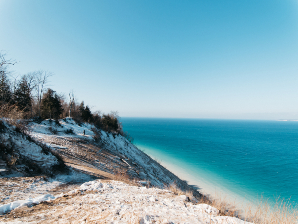 Gorgeous winter scenery of Lake Michigan at Sleeping Bear Dunes - one of the best things to do in Traverse City in the winter