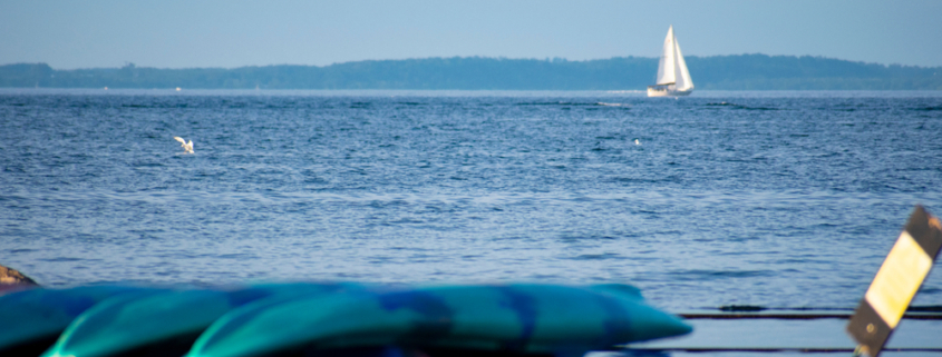 Get out on the bay for kayaking or sailing - one of the best things to do in Traverse City near our Bed and Breakfast